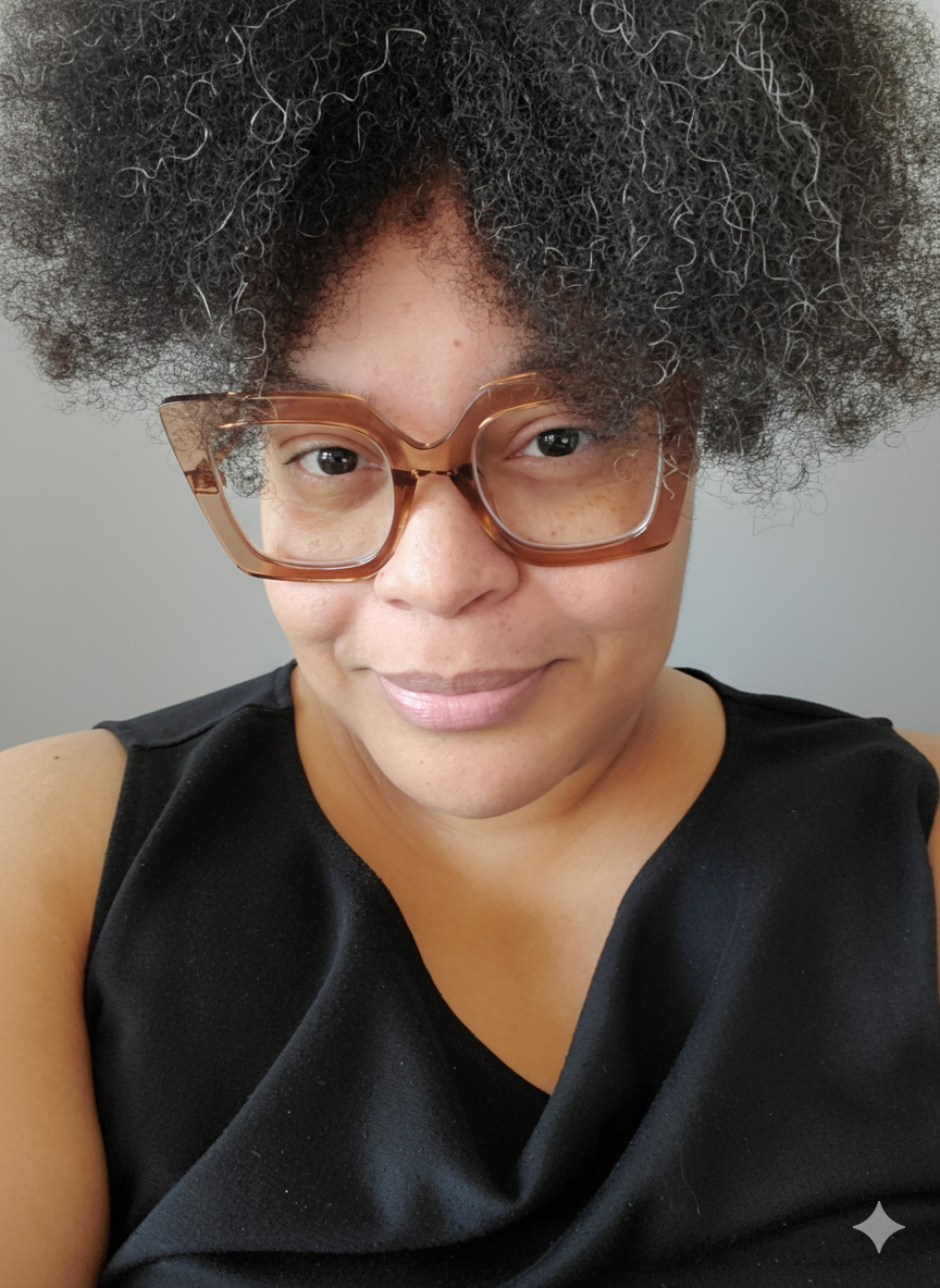 Headshot of Tiana Symmonds in glasses and black dress